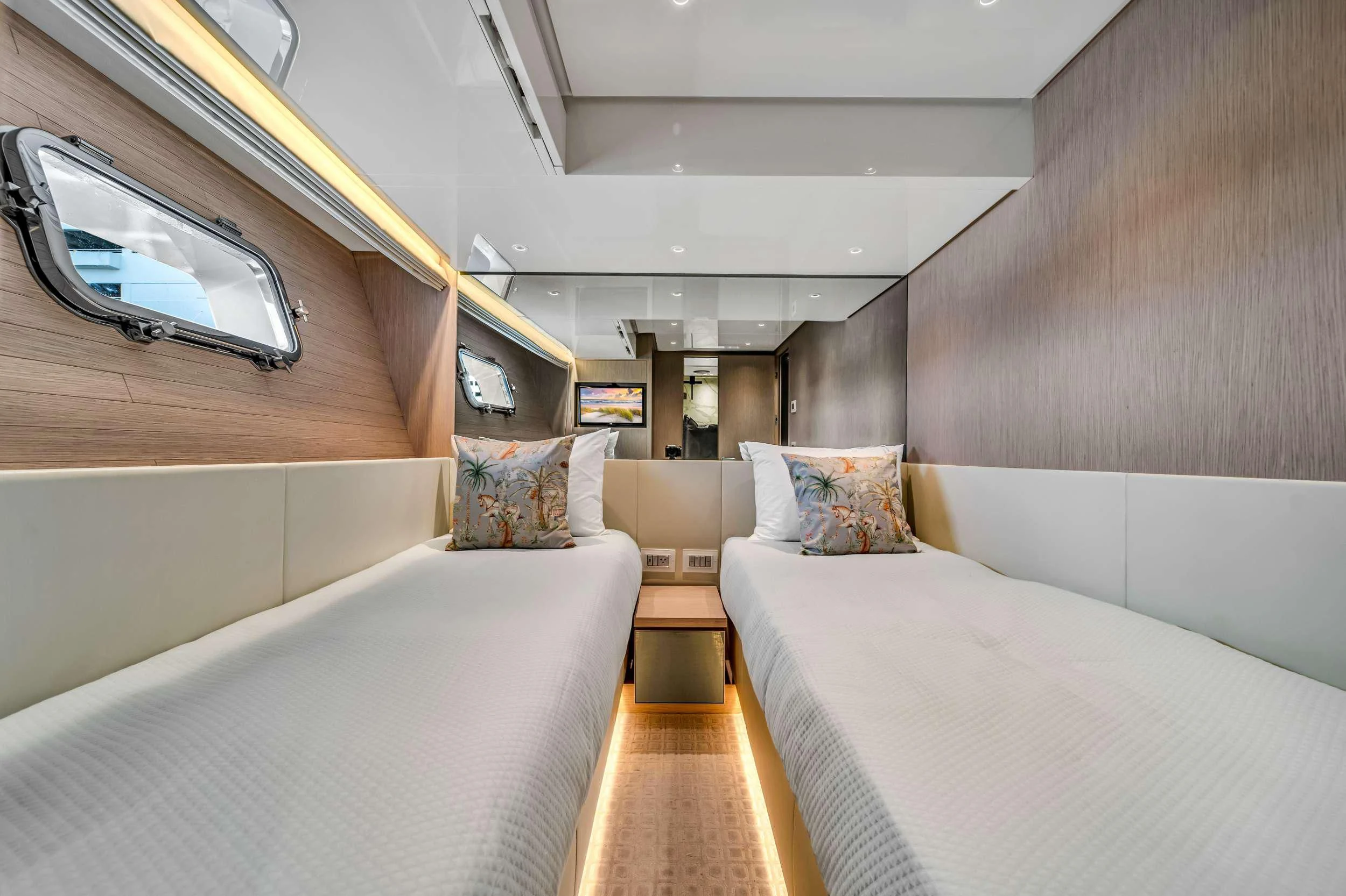 a room with a bed and a tv aboard MAVE Yacht for Sale