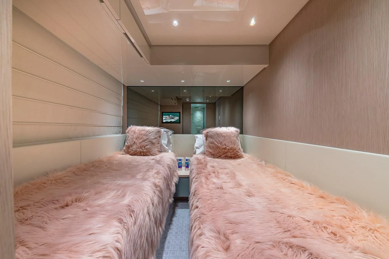 a couple of beds in a room aboard MAVE Yacht for Sale