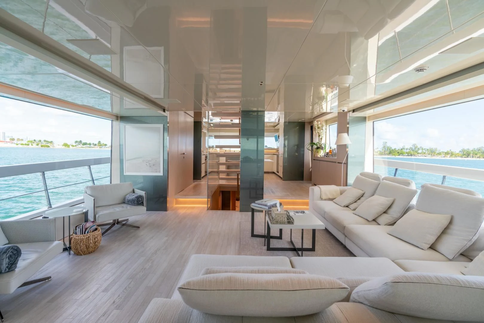 a living room with a large window aboard MAVE Yacht for Sale