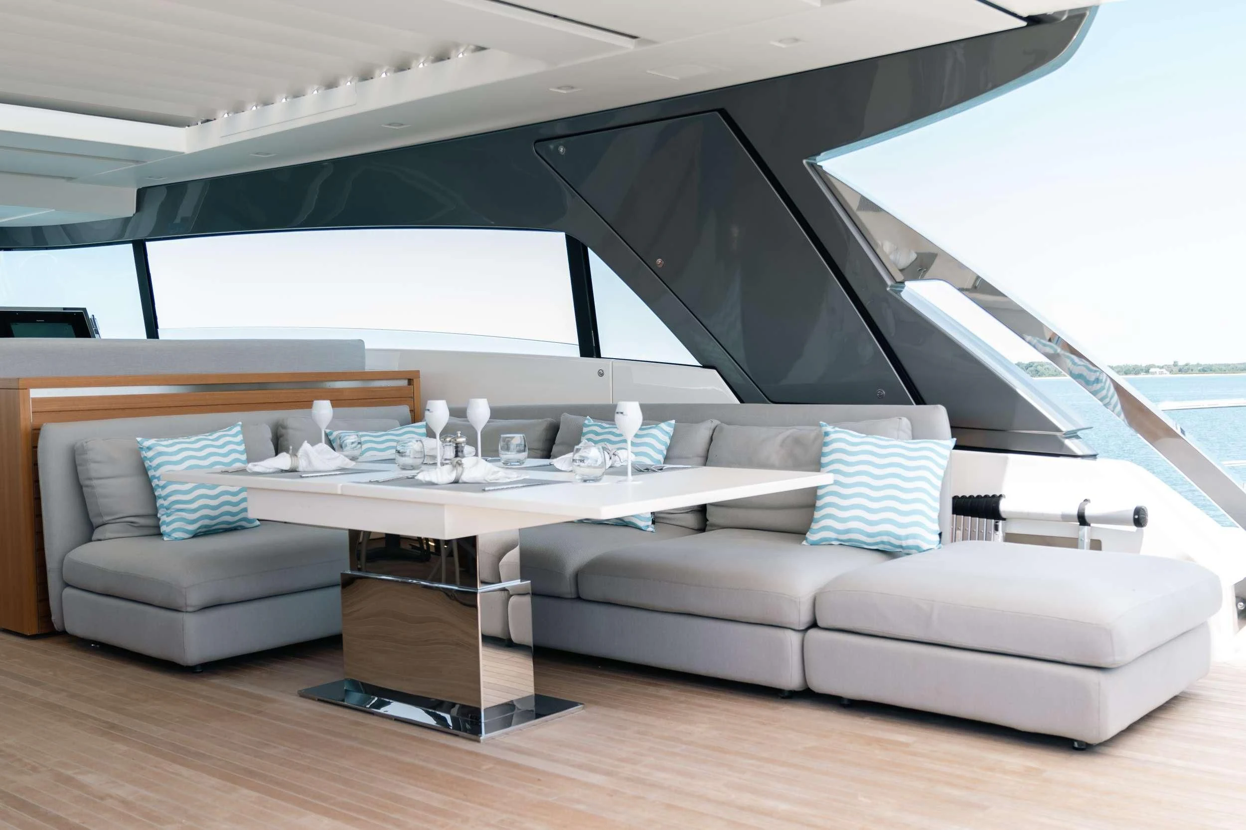 a modern living room with a large glass ceiling aboard MAVE Yacht for Sale