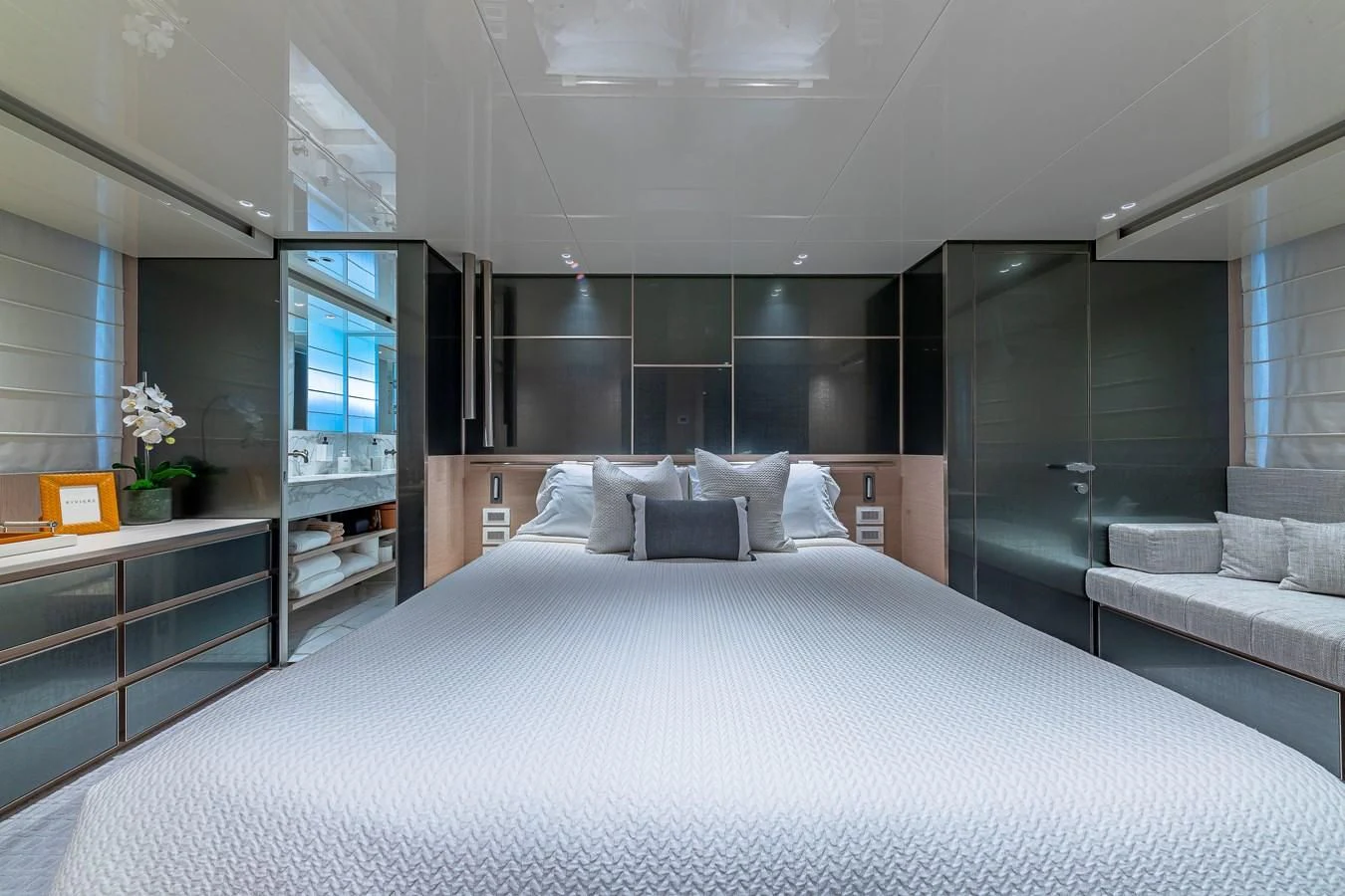 a large bed in a room aboard MAVE Yacht for Sale
