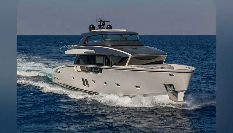 a white yacht on the water aboard MAVE Yacht for Sale