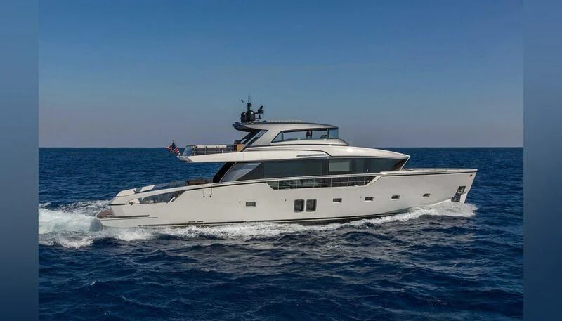 a white yacht in the water aboard MAVE Yacht for Sale