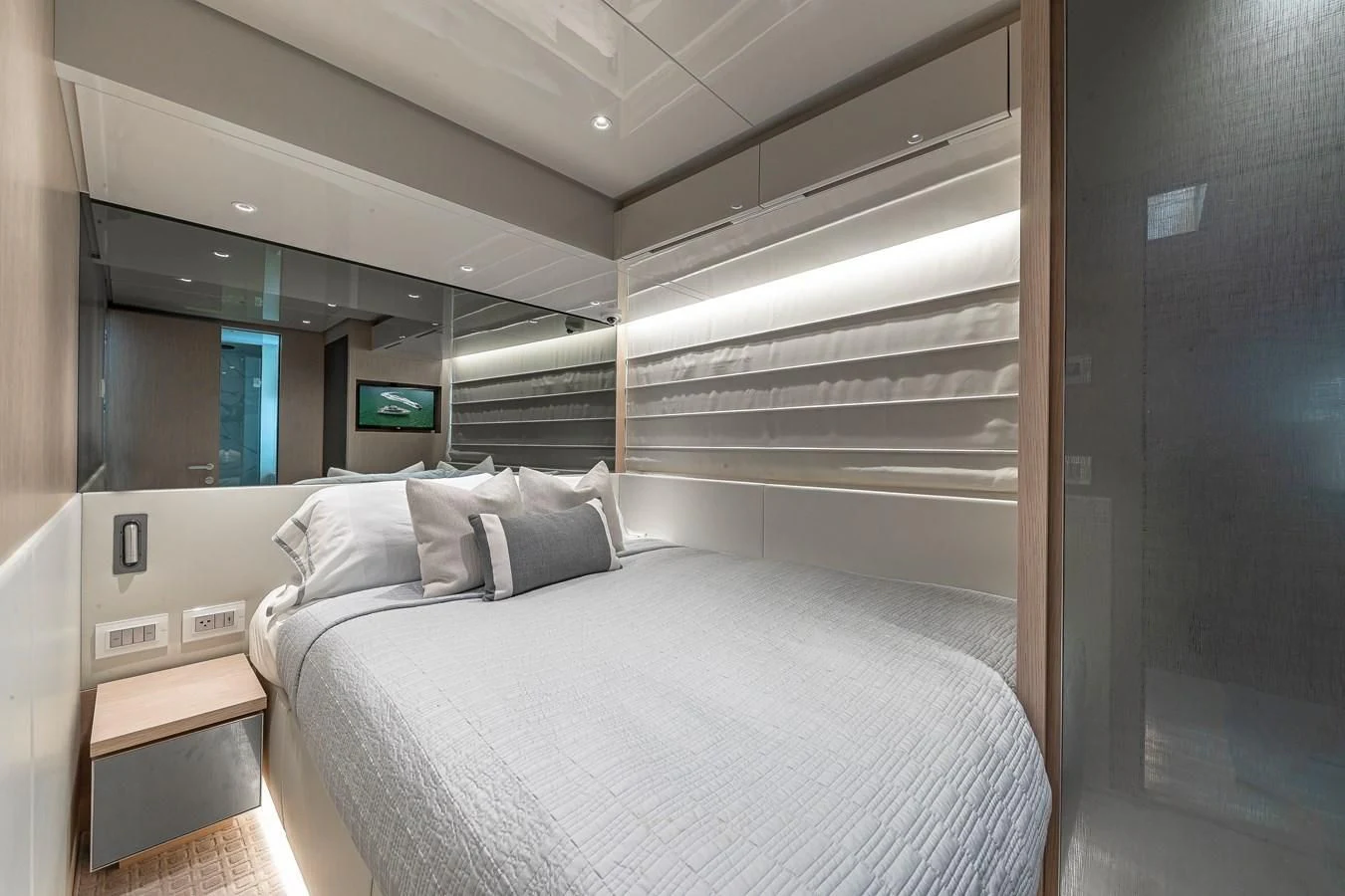 a bed in a room aboard MAVE Yacht for Sale