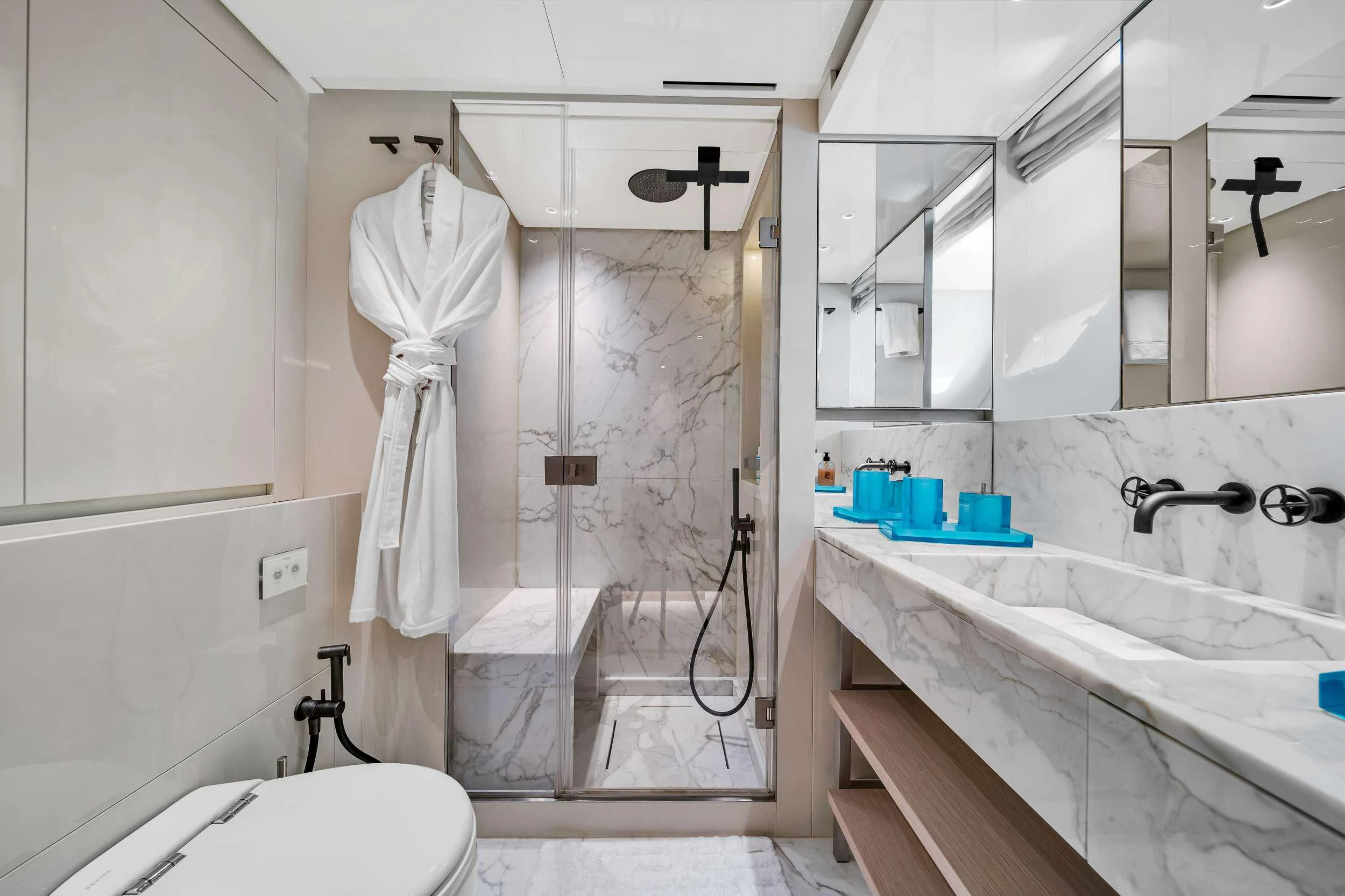 a bathroom with a tub sink and a shower unit aboard MAVE Yacht for Sale