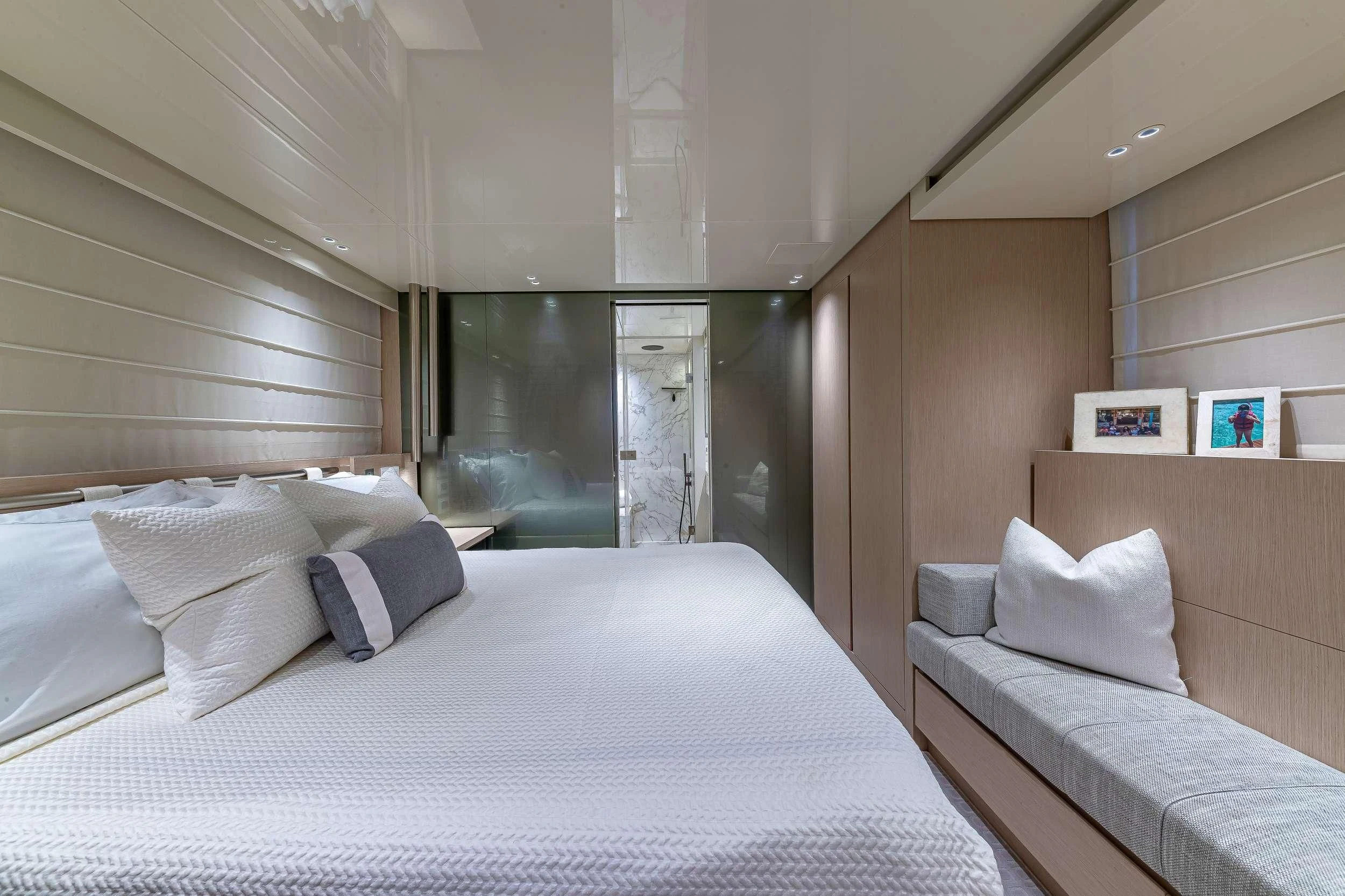 a room with two beds aboard MAVE Yacht for Sale