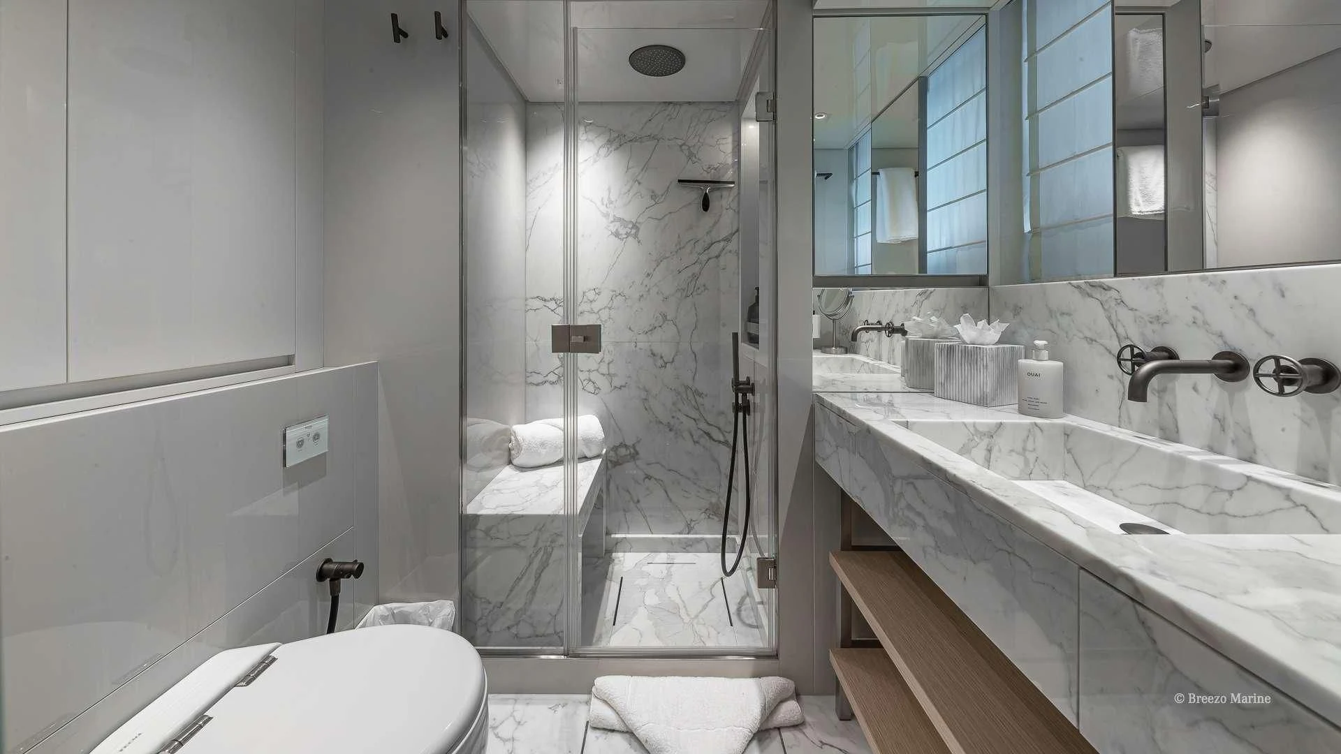 a bathroom with a glass shower aboard MAVE Yacht for Sale