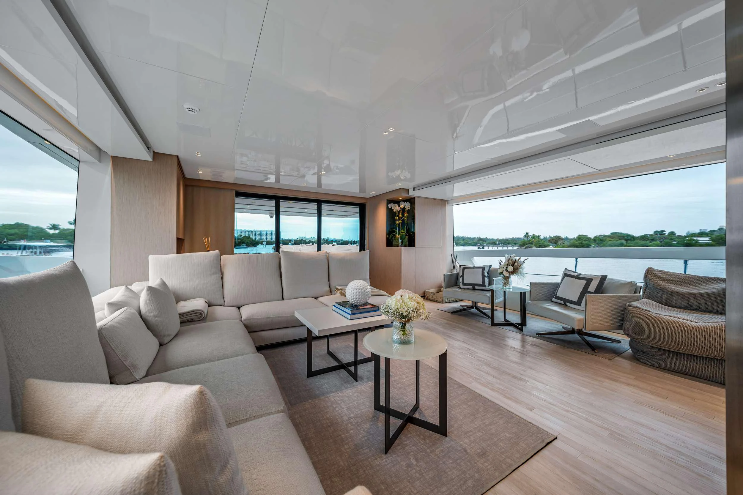a living room with a large window aboard MAVE Yacht for Sale
