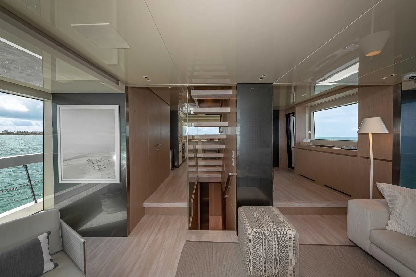 a room with a large window and a staircase aboard MAVE Yacht for Sale