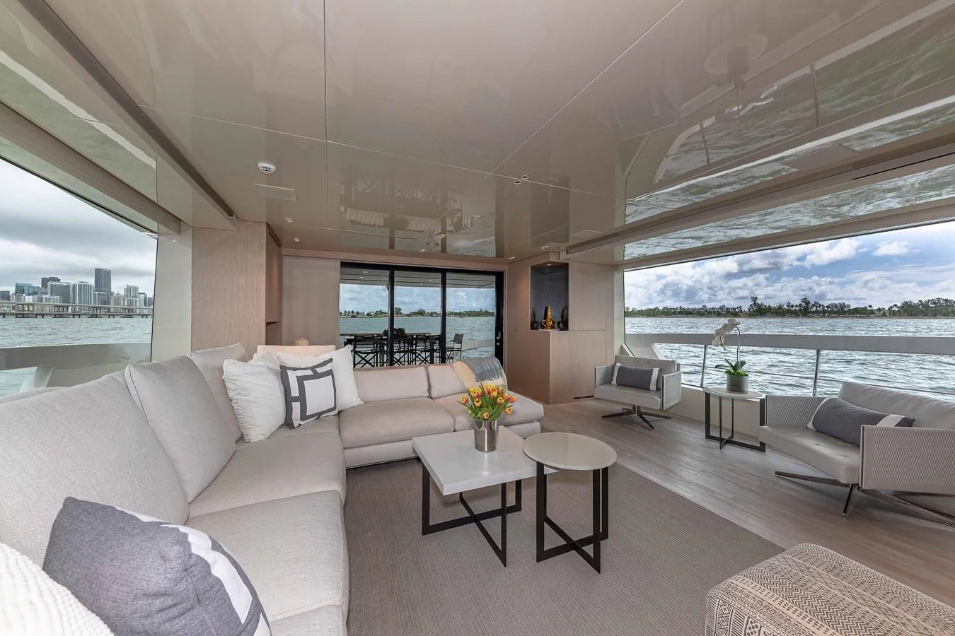a living room with a large window aboard MAVE Yacht for Sale