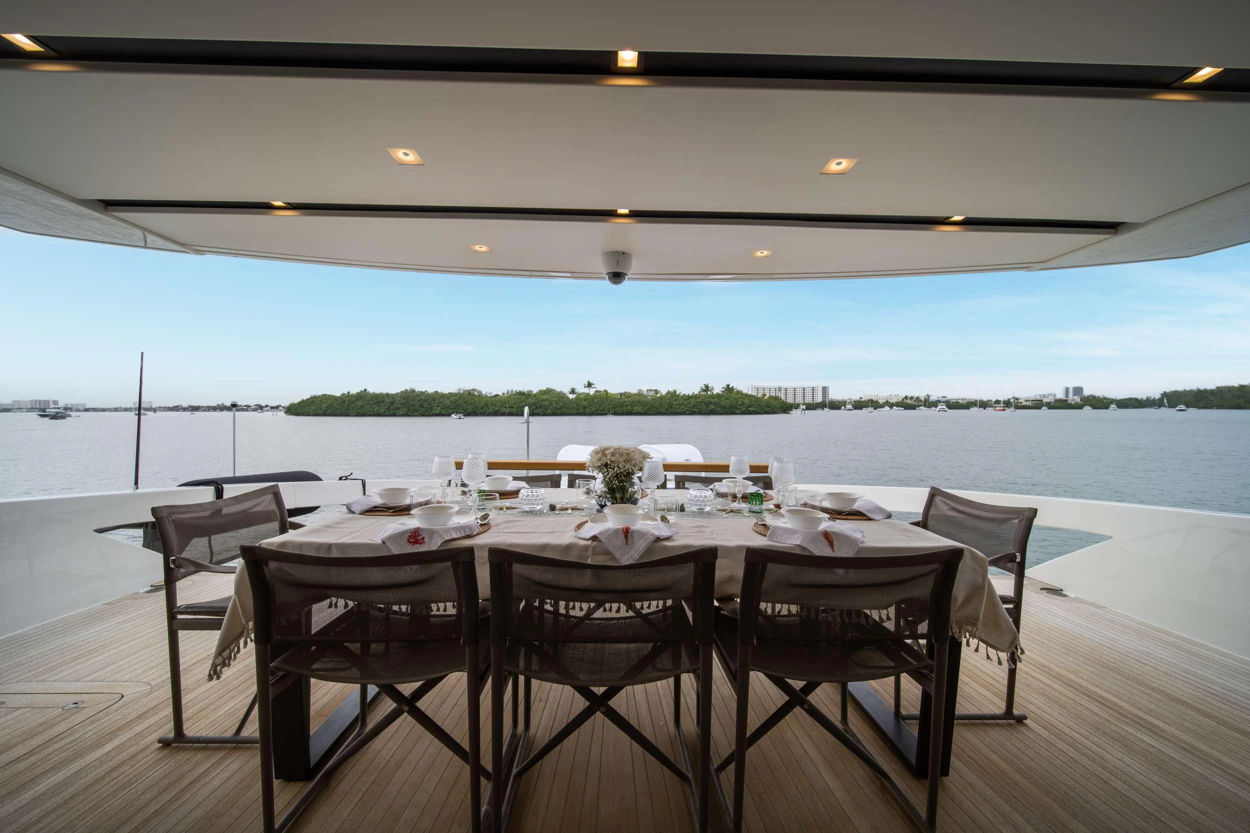 a table set for a dinner aboard MAVE Yacht for Sale