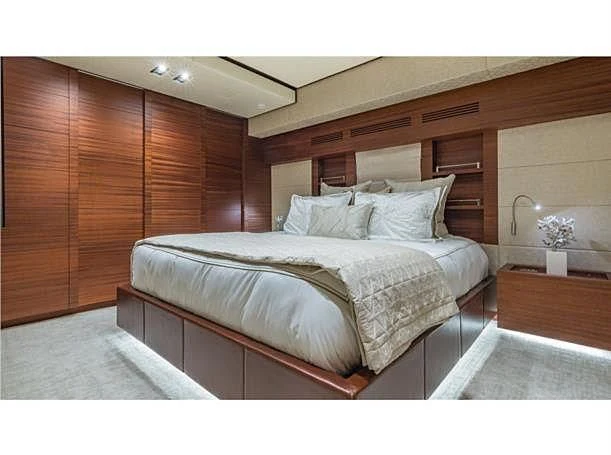 a bed in a room aboard PRIMA MEA Yacht for Sale