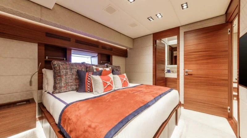 a bed in a room aboard PRIMA MEA Yacht for Sale
