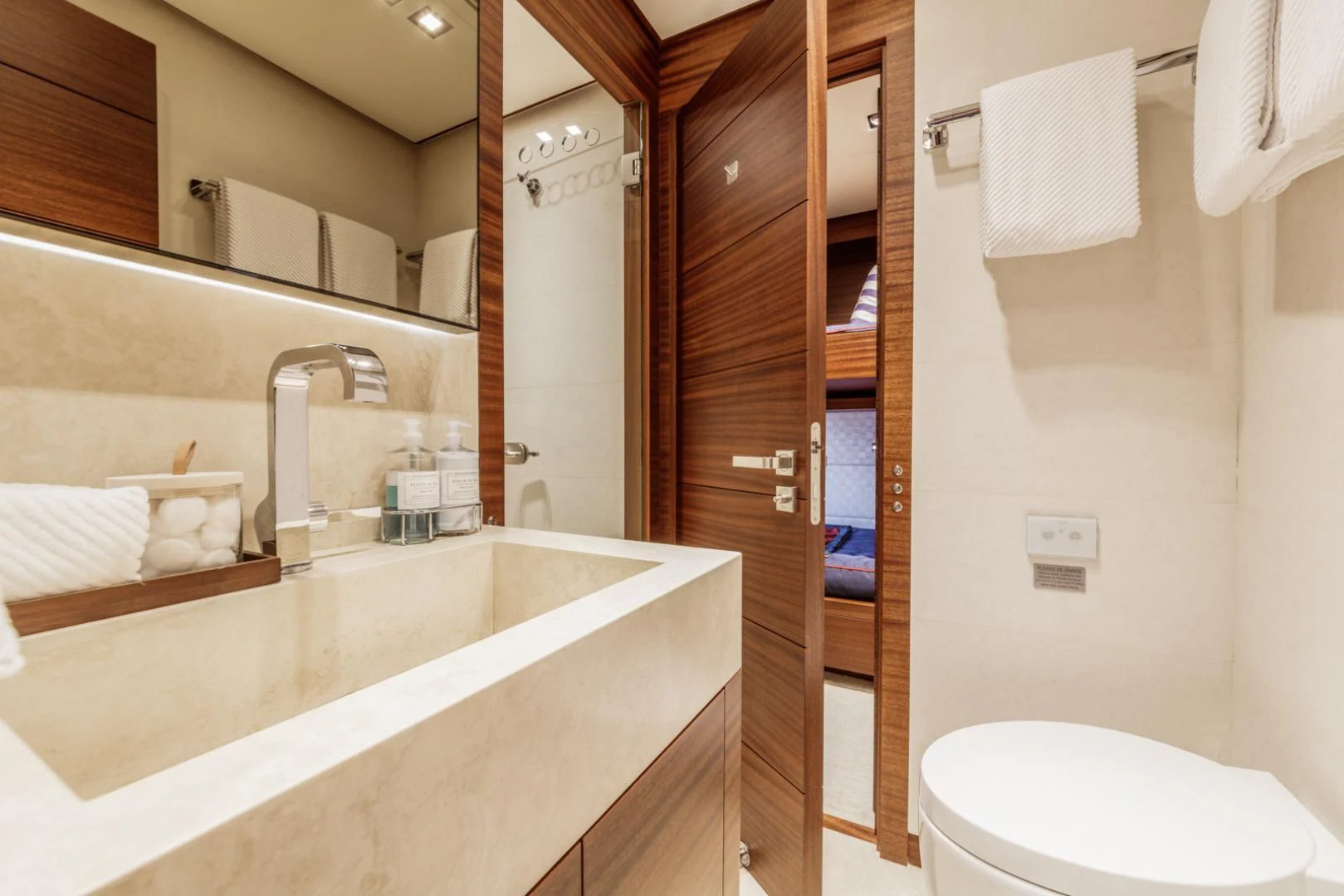a bathroom with a sink and toilet aboard PRIMA MEA Yacht for Sale