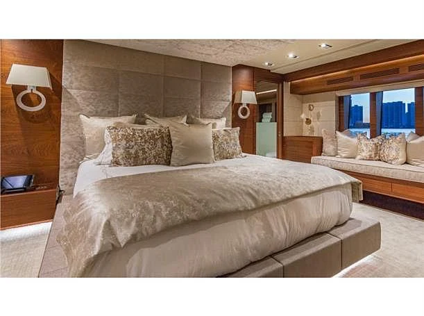 a bed with pillows aboard PRIMA MEA Yacht for Sale