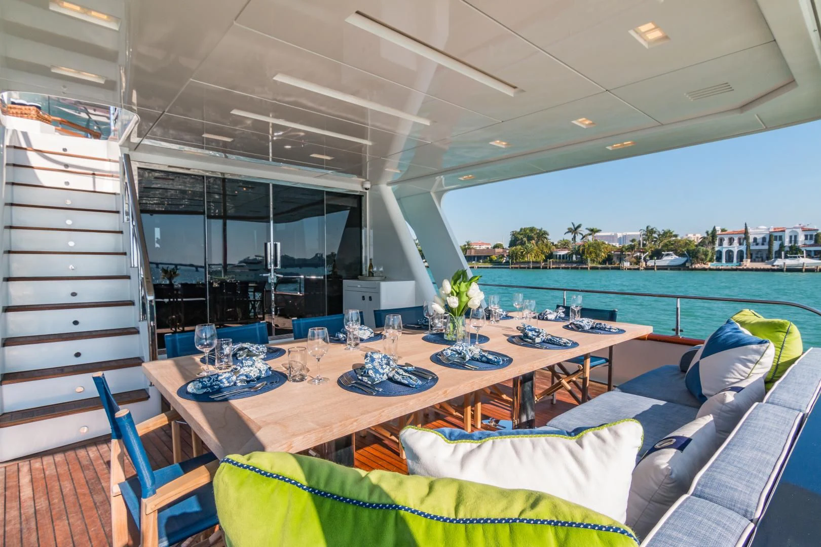 a room with a table and chairs aboard PRIMA MEA Yacht for Sale
