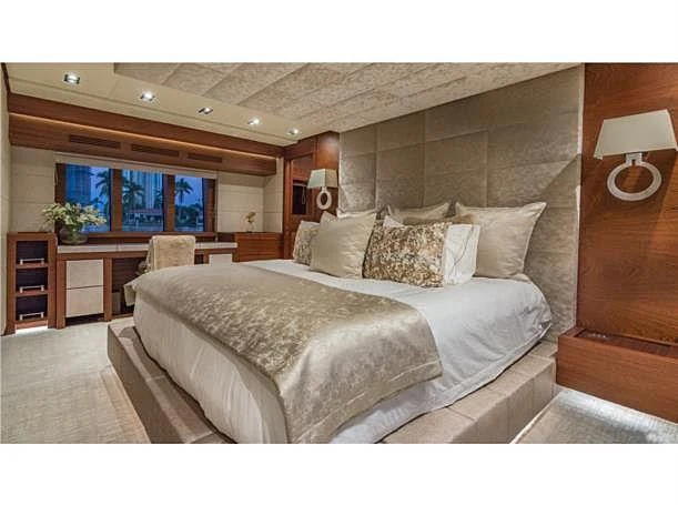 a large bed in a room aboard PRIMA MEA Yacht for Sale