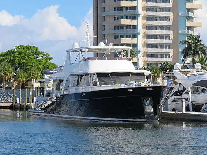 a boat docked at a pier aboard PRIMA MEA Yacht for Sale