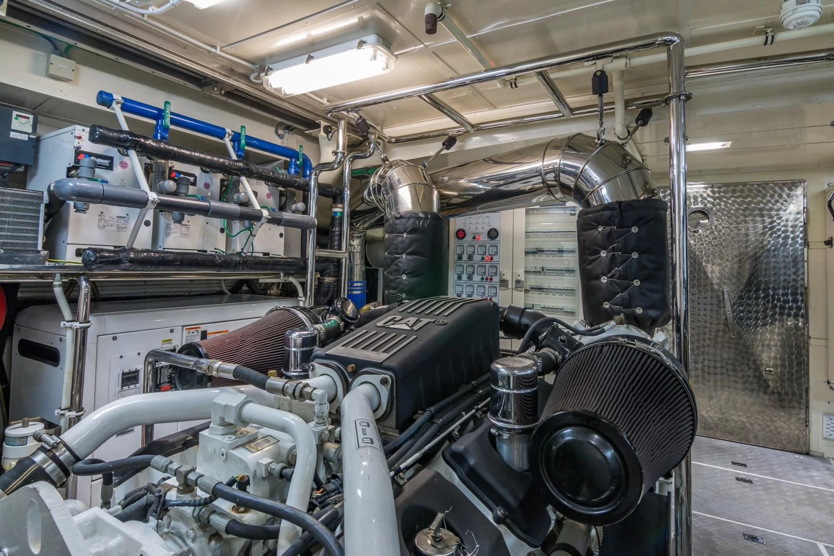 a large machine with a large metal pipe aboard PRIMA MEA Yacht for Sale