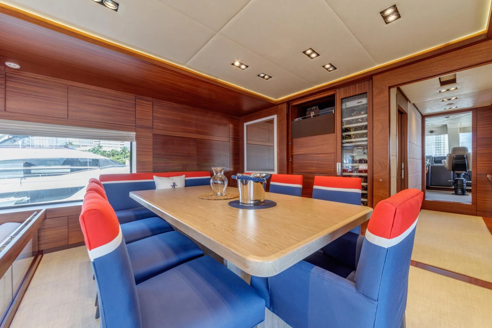 a table and chairs in a room aboard PRIMA MEA Yacht for Sale