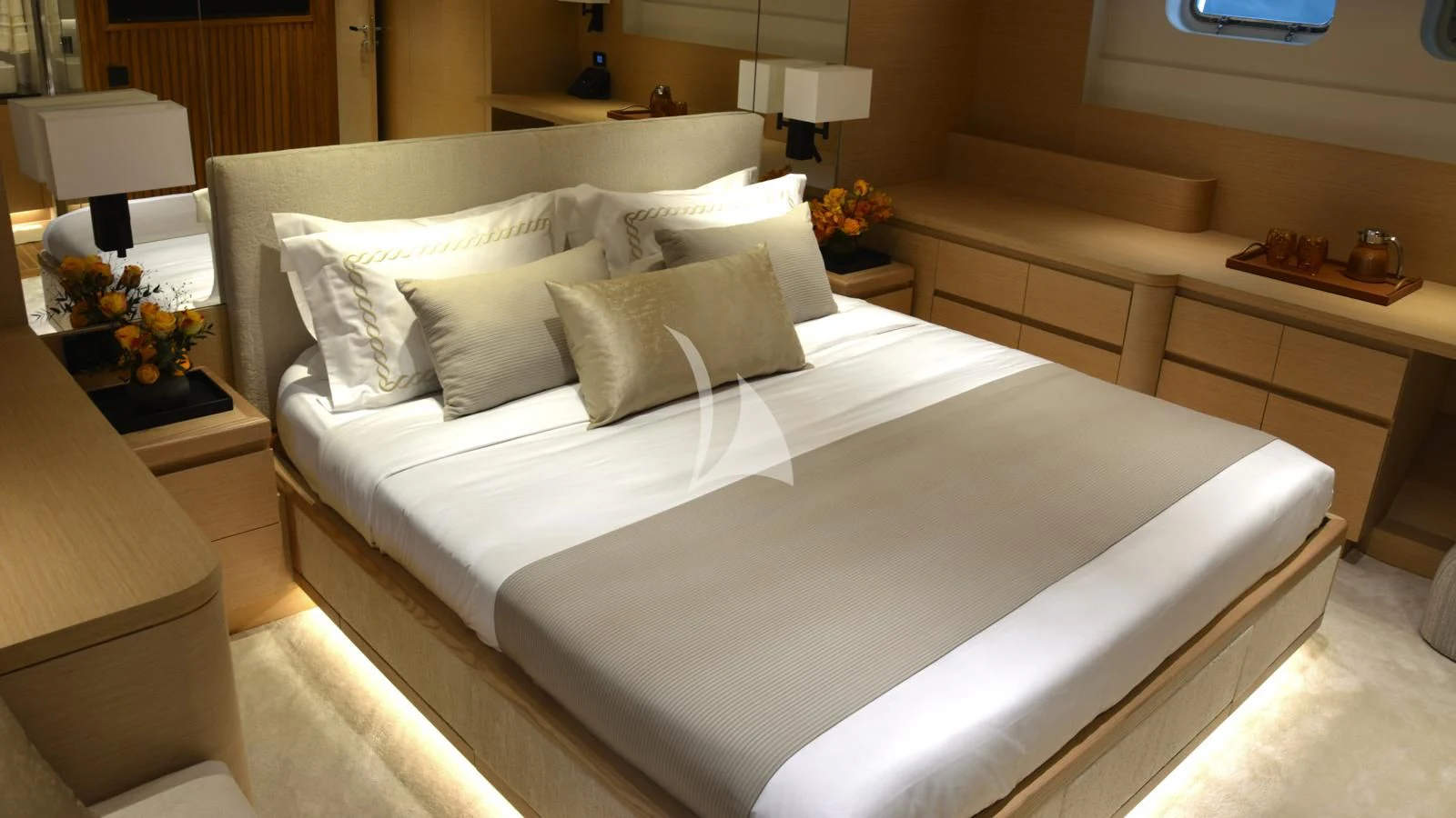a bed with white sheets aboard XIPHIAS Yacht for Charter