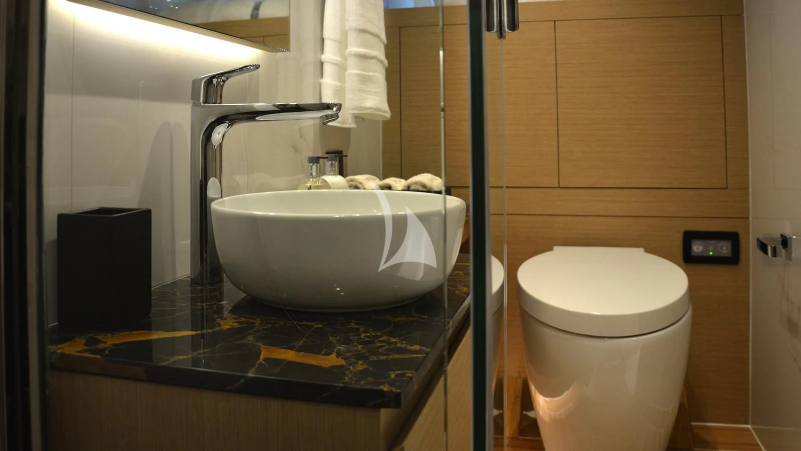 a bathroom with a sink and toilet aboard XIPHIAS Yacht for Charter
