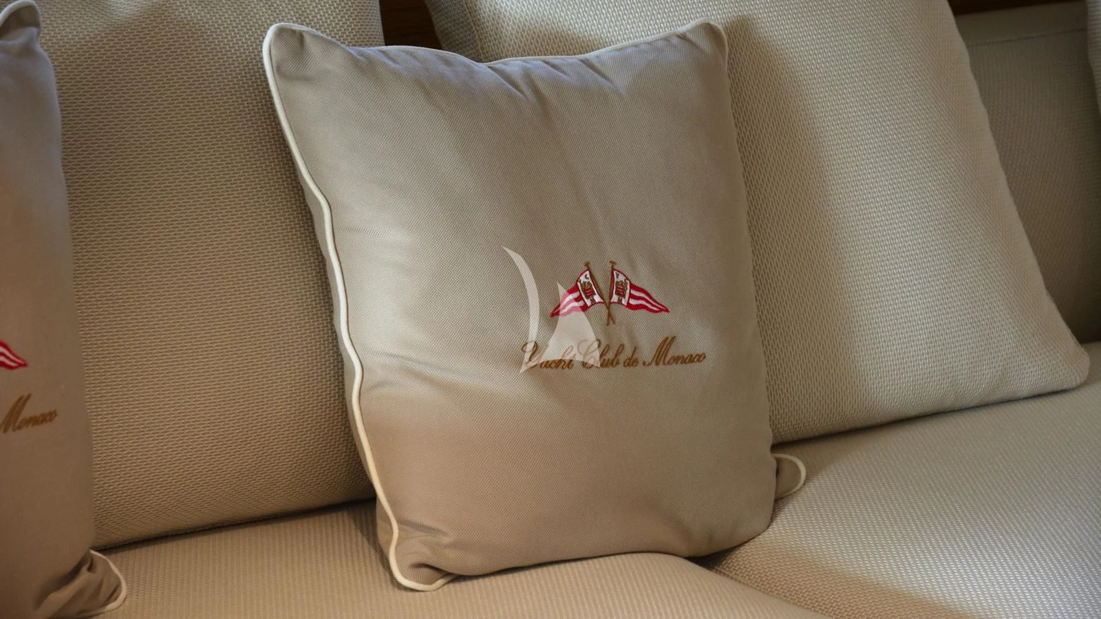 a pillow on a couch aboard XIPHIAS Yacht for Charter