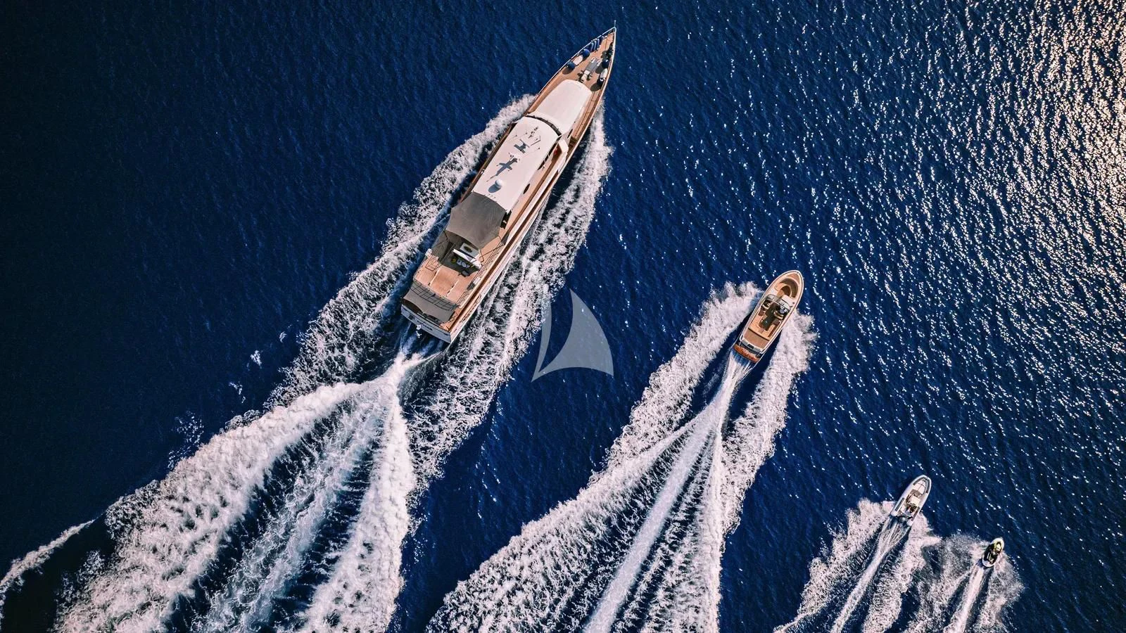 a space shuttle flying over a planet aboard XIPHIAS Yacht for Charter