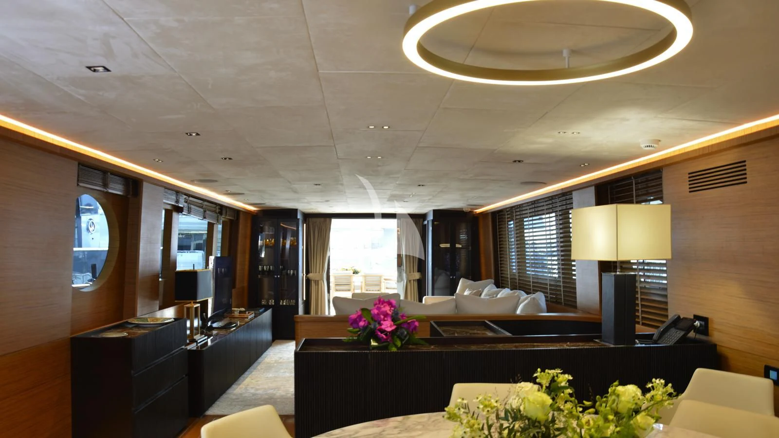 a room with a couch and a table aboard XIPHIAS Yacht for Charter