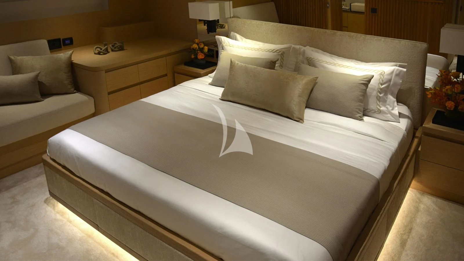 a bed with white sheets aboard XIPHIAS Yacht for Charter