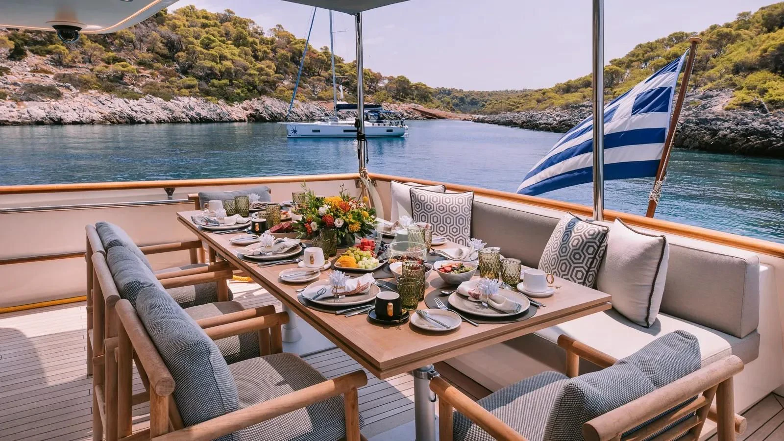 a table with food on it aboard XIPHIAS Yacht for Charter