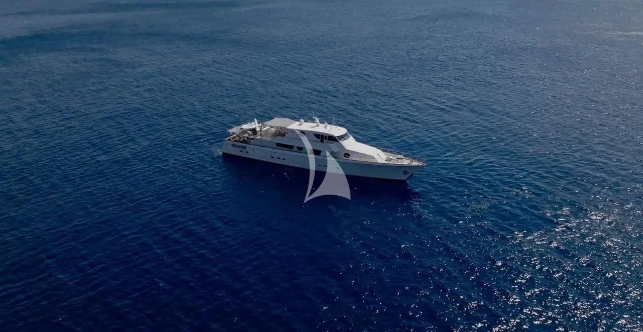 a white boat in the water aboard XIPHIAS Yacht for Charter