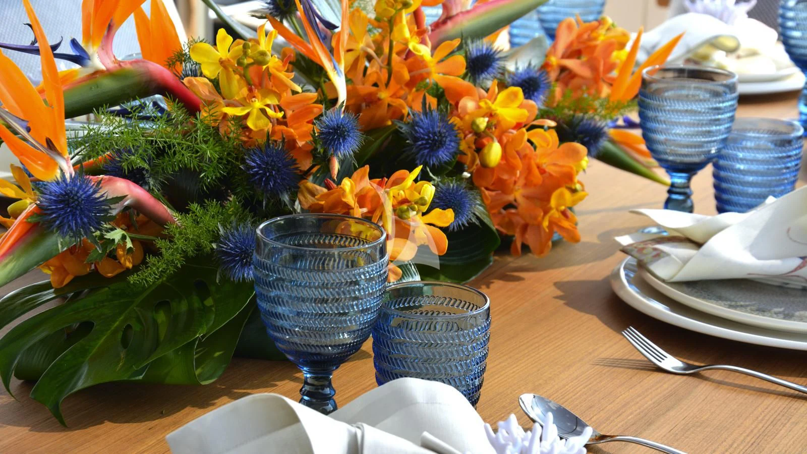 a table with many flowers aboard XIPHIAS Yacht for Charter