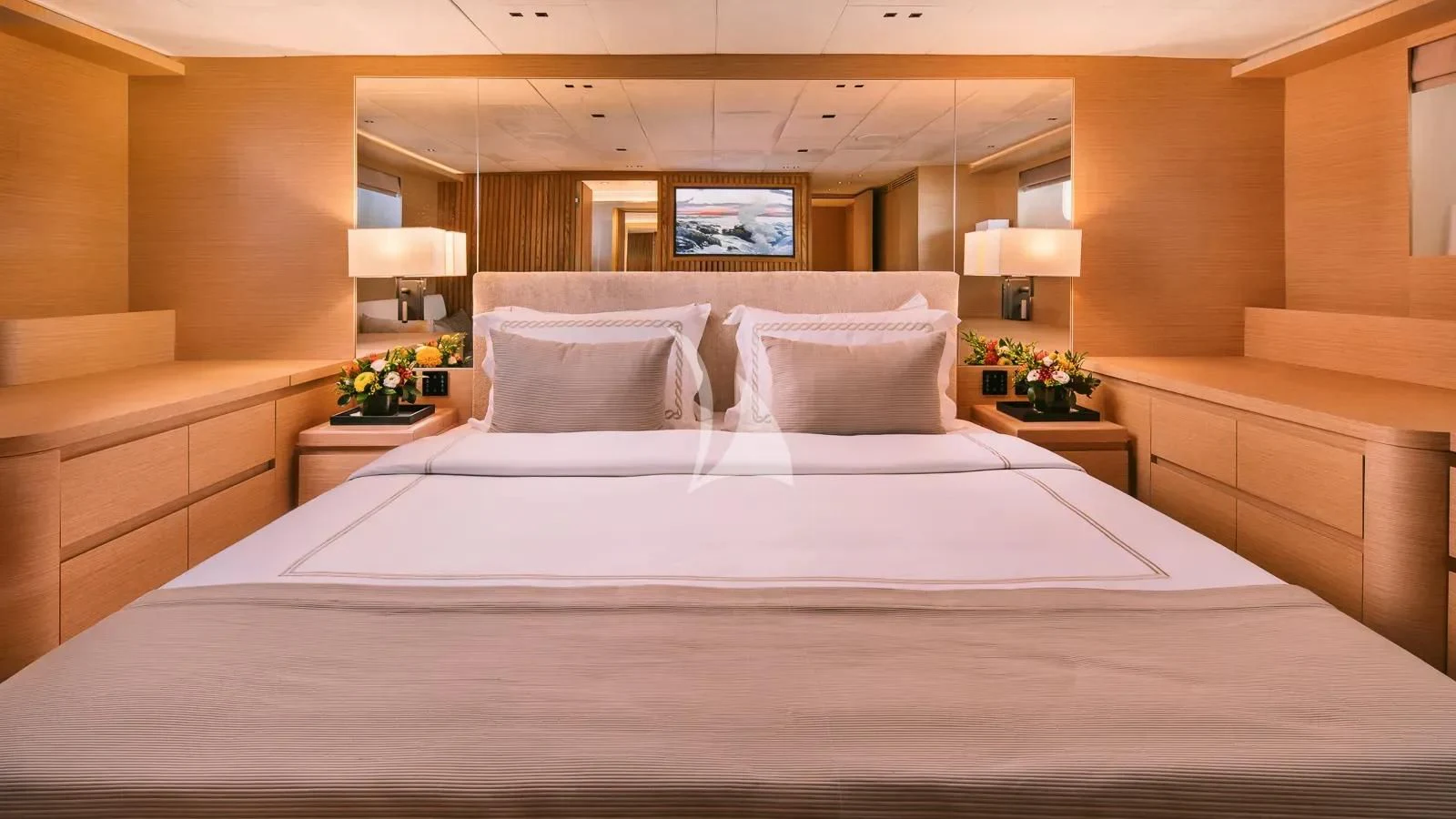 a bed with white sheets aboard XIPHIAS Yacht for Charter