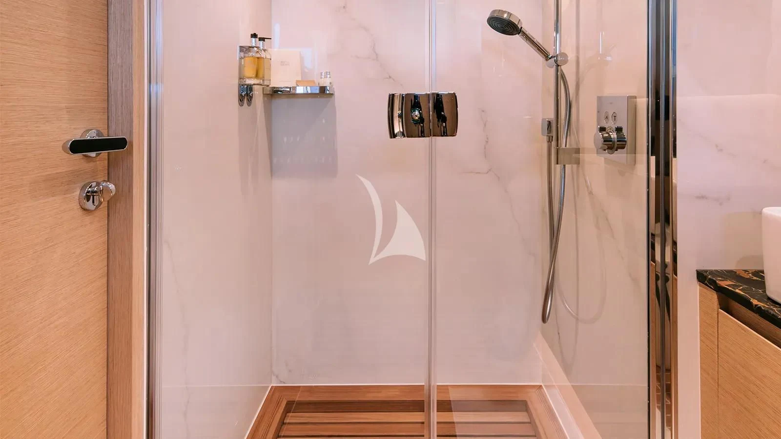 a shower with a glass door aboard XIPHIAS Yacht for Charter
