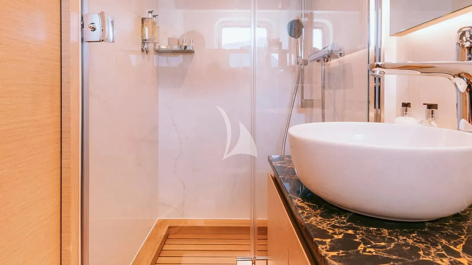 a bathroom with a bathtub and shower aboard XIPHIAS Yacht for Charter