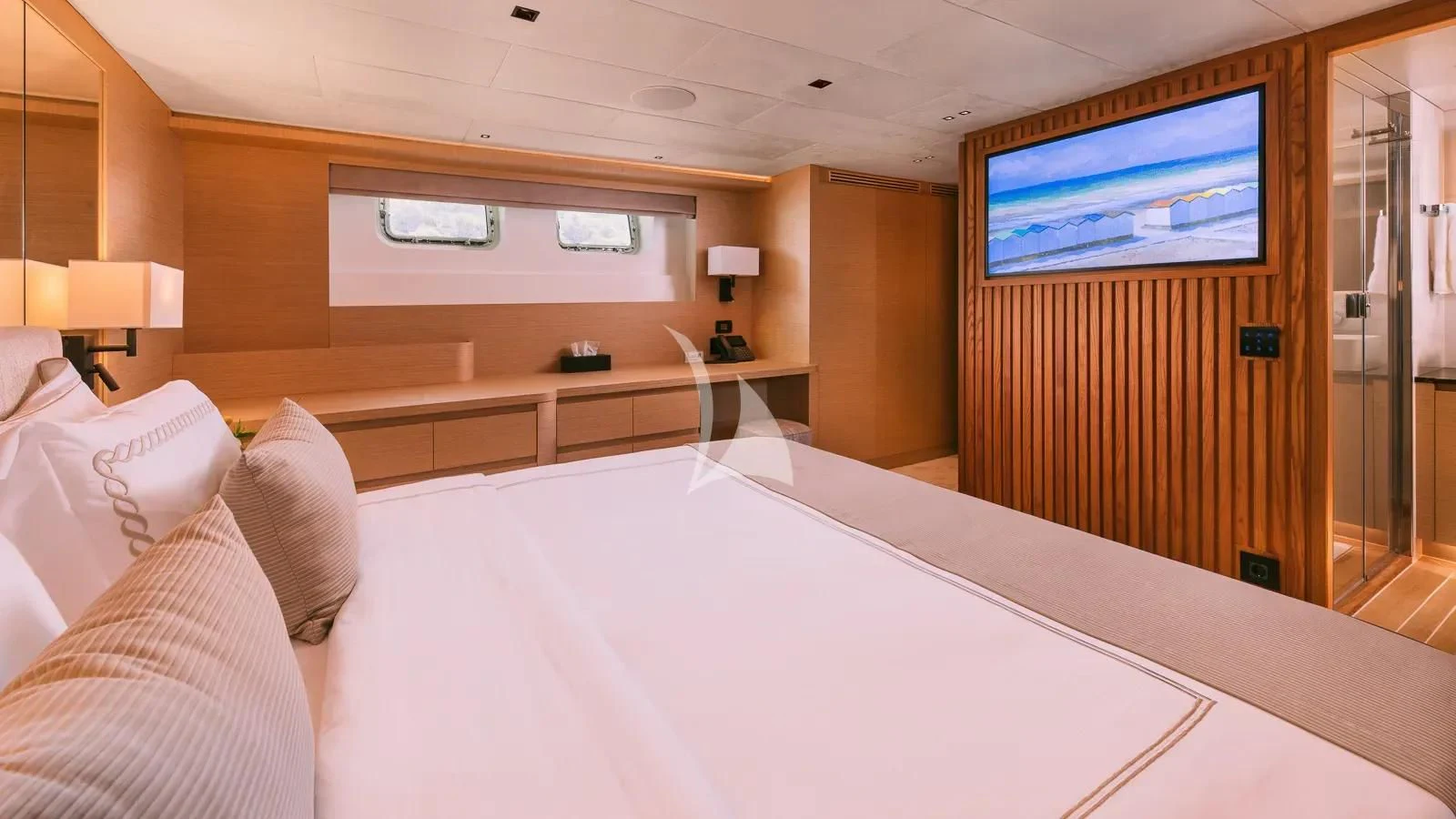 a hotel room with a large bed aboard XIPHIAS Yacht for Charter