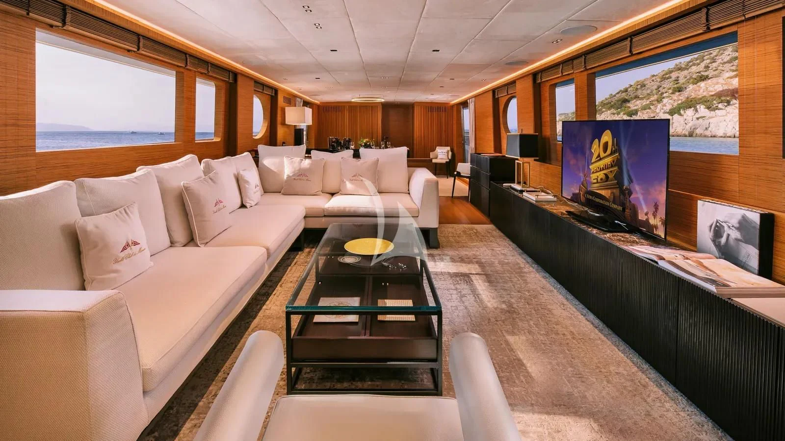 a living room with a large painting aboard XIPHIAS Yacht for Charter