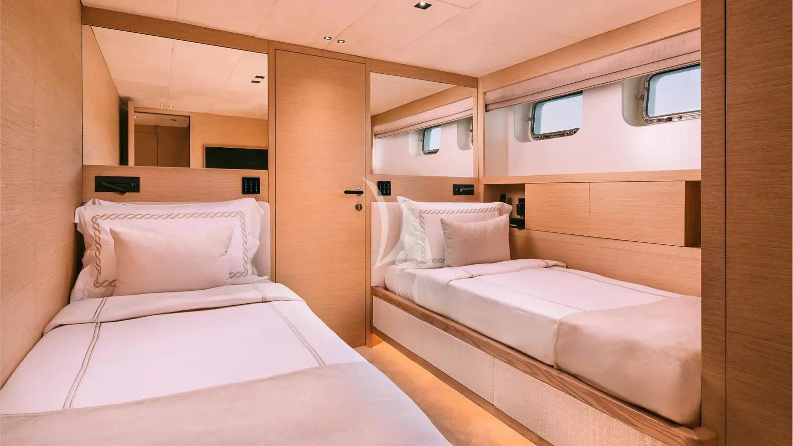 a room with three beds aboard XIPHIAS Yacht for Charter
