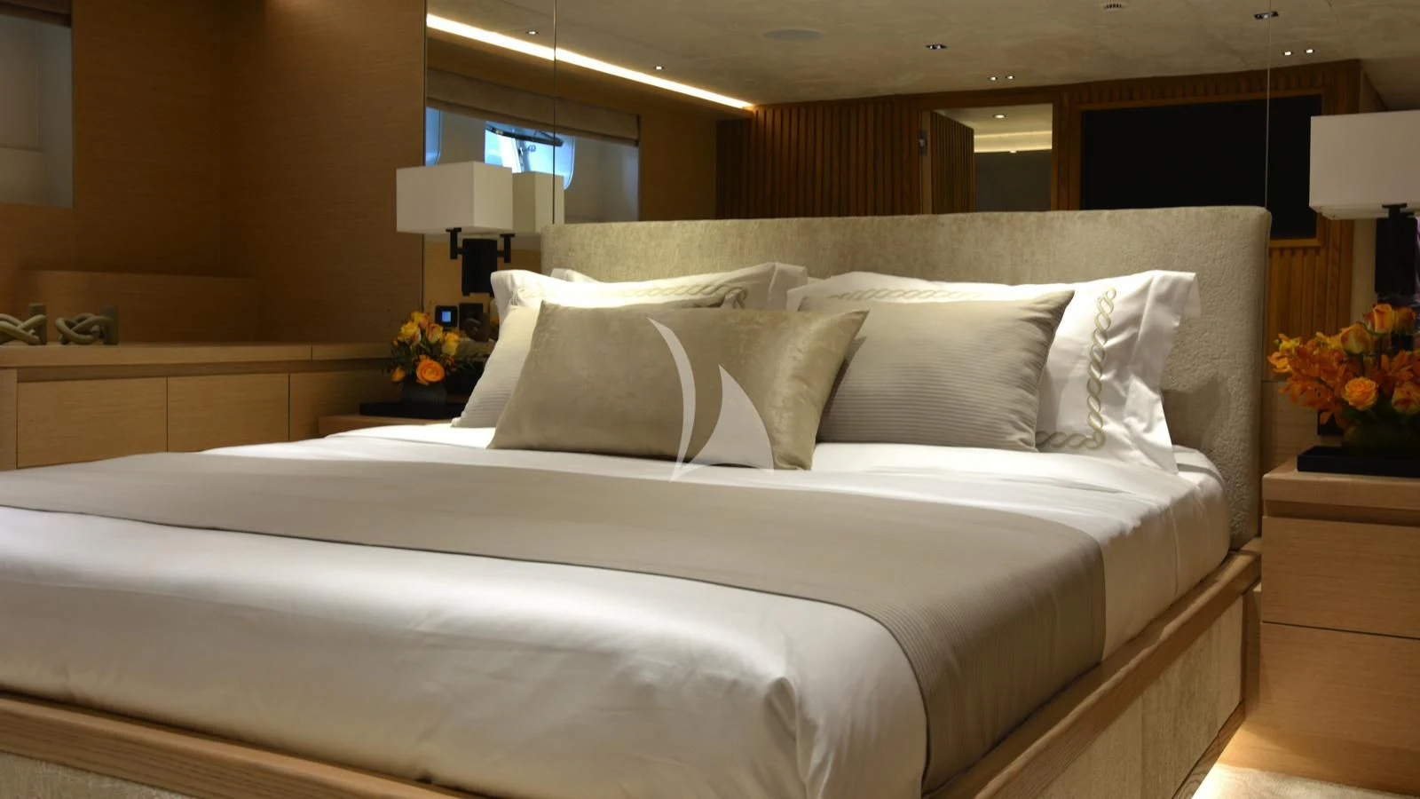 a bed with white sheets aboard XIPHIAS Yacht for Charter