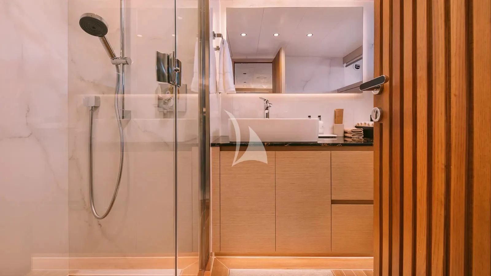 a bathroom with a shower and sink aboard XIPHIAS Yacht for Charter
