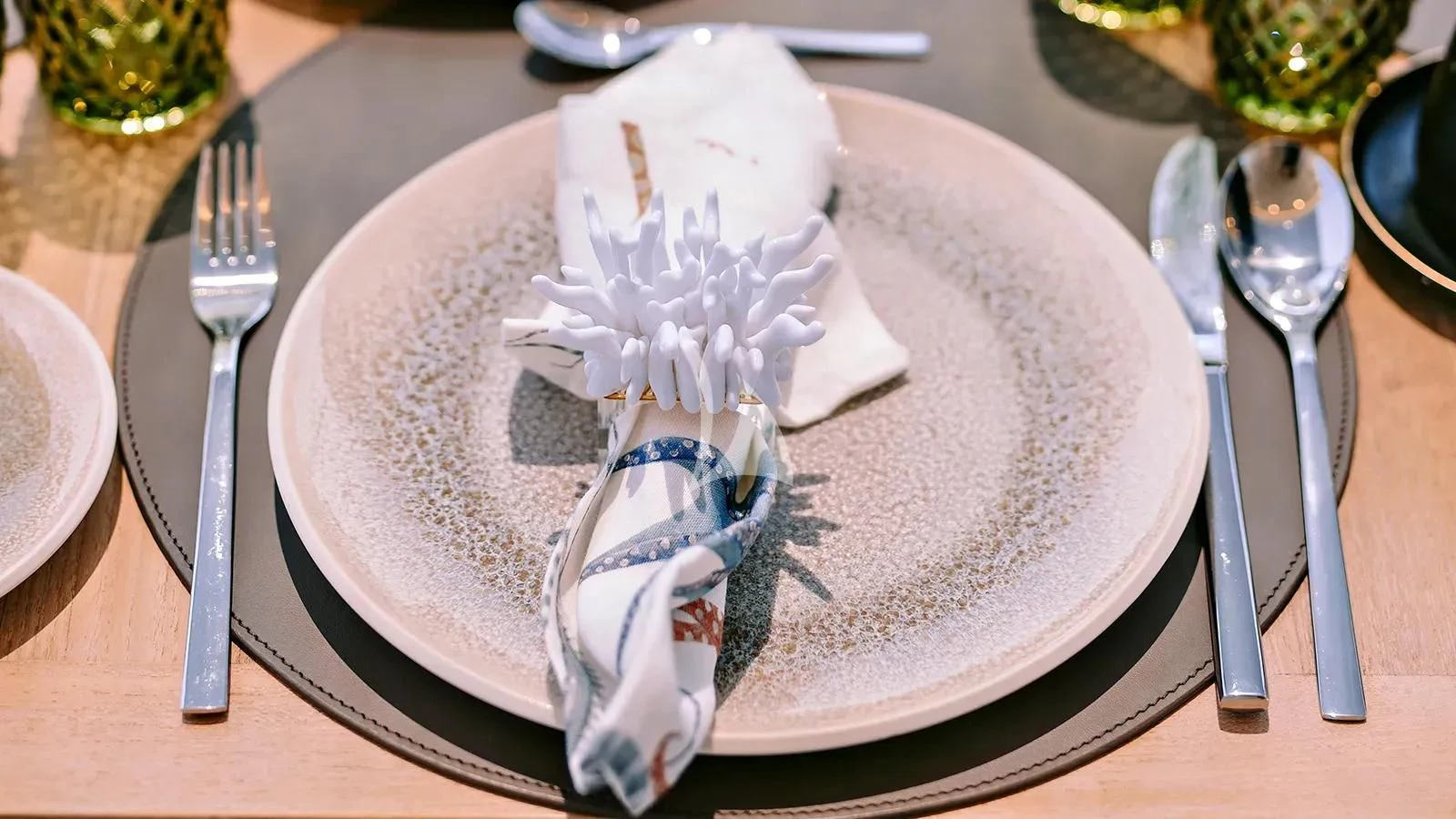 a plate with a piece of cake on it aboard XIPHIAS Yacht for Charter