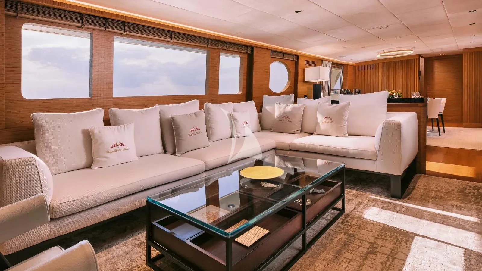 a living room with a large sofa aboard XIPHIAS Yacht for Charter