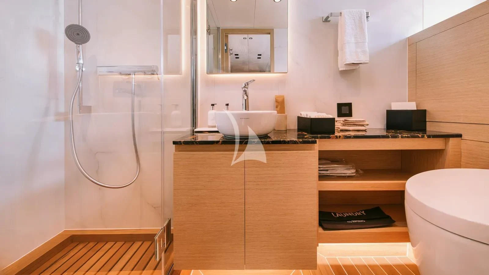 a bathroom with a sink and a toilet aboard XIPHIAS Yacht for Charter