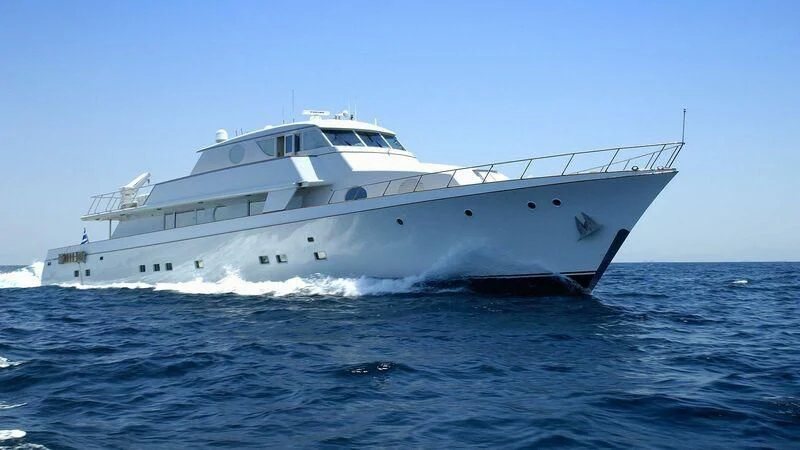 a large white boat in the water aboard XIPHIAS Yacht for Charter