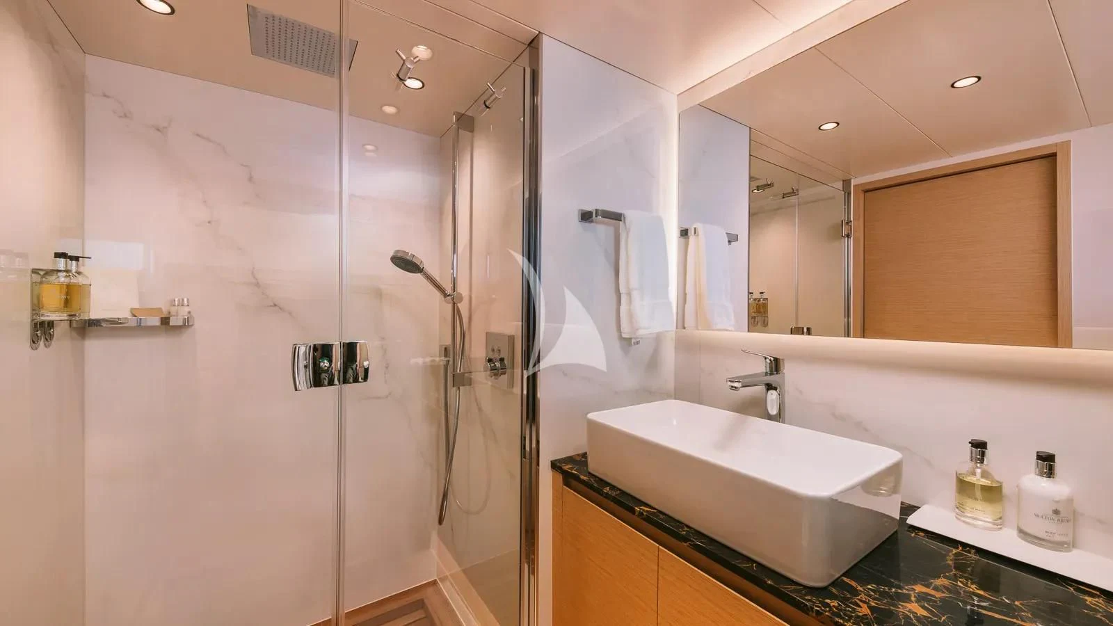 a bathroom with a shower and sink aboard XIPHIAS Yacht for Charter