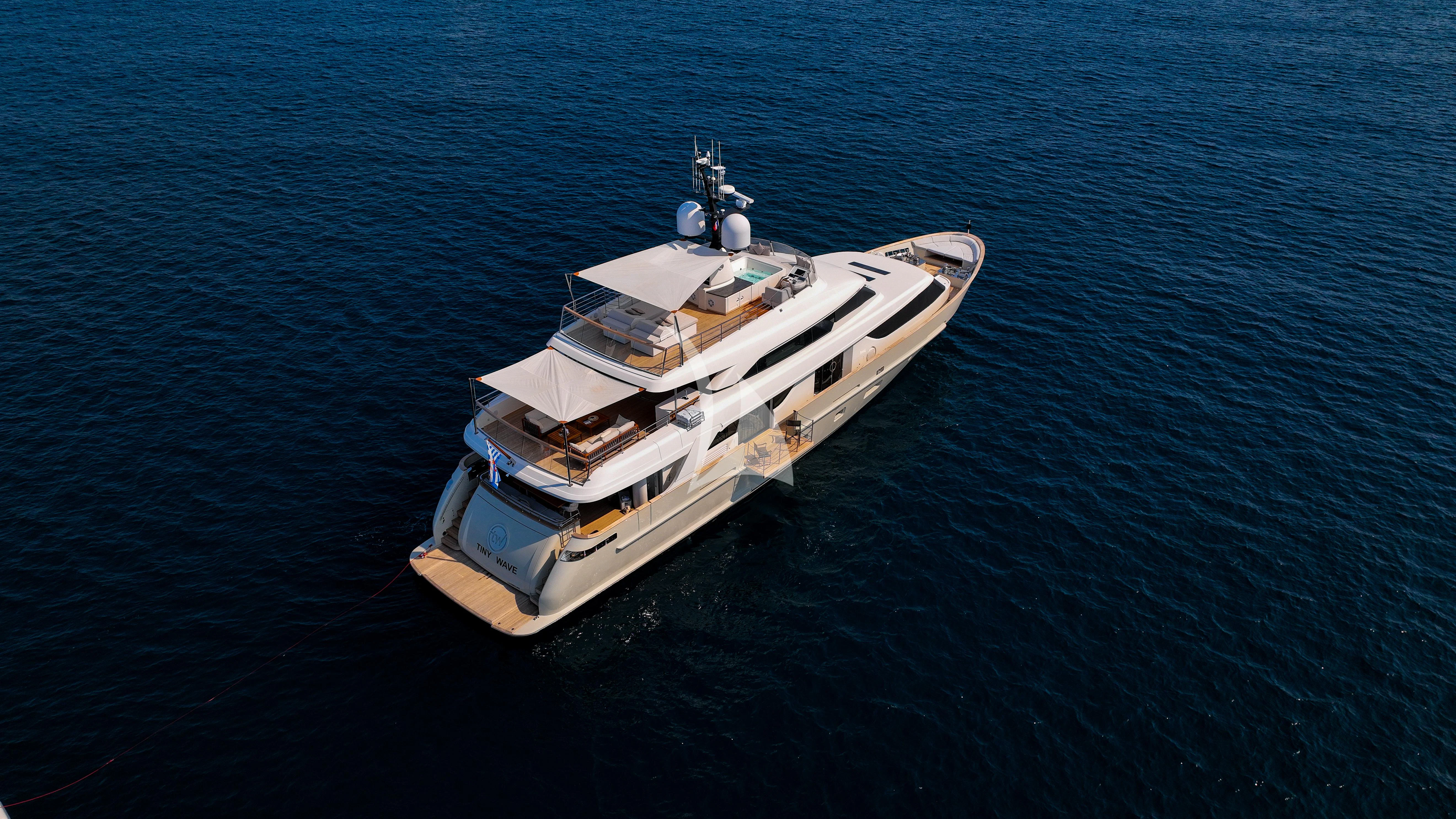 a boat in the water aboard TINY WAVE Yacht for Sale