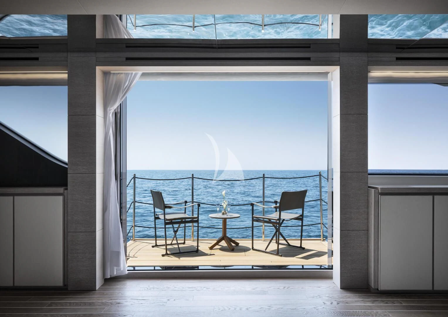 a room with a table and chairs aboard TINY WAVE Yacht for Sale