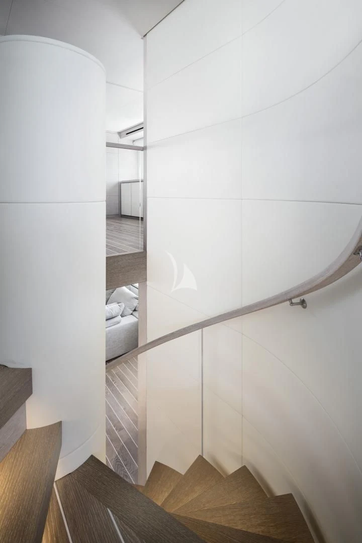 a white tiled bathroom aboard TINY WAVE Yacht for Sale