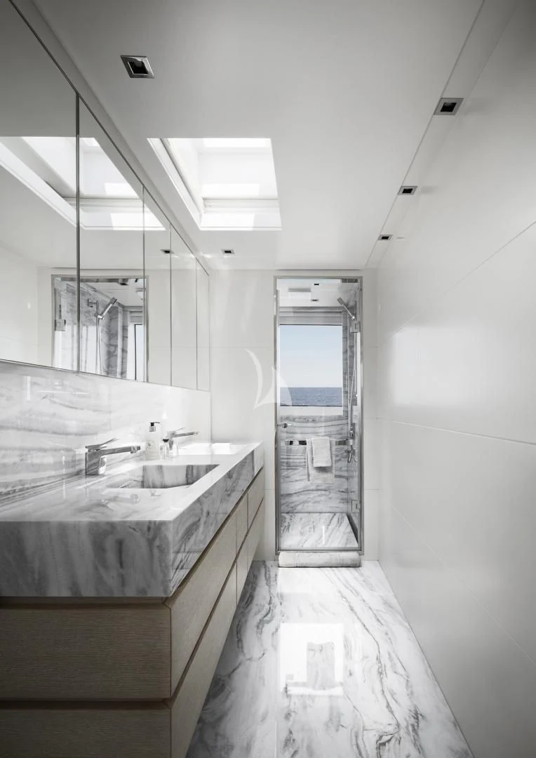 a bathroom with a marble counter top aboard TINY WAVE Yacht for Sale